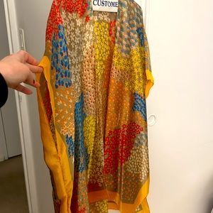 Vibrant colors in this kimono. Worn 1x. Recently dry cleaned